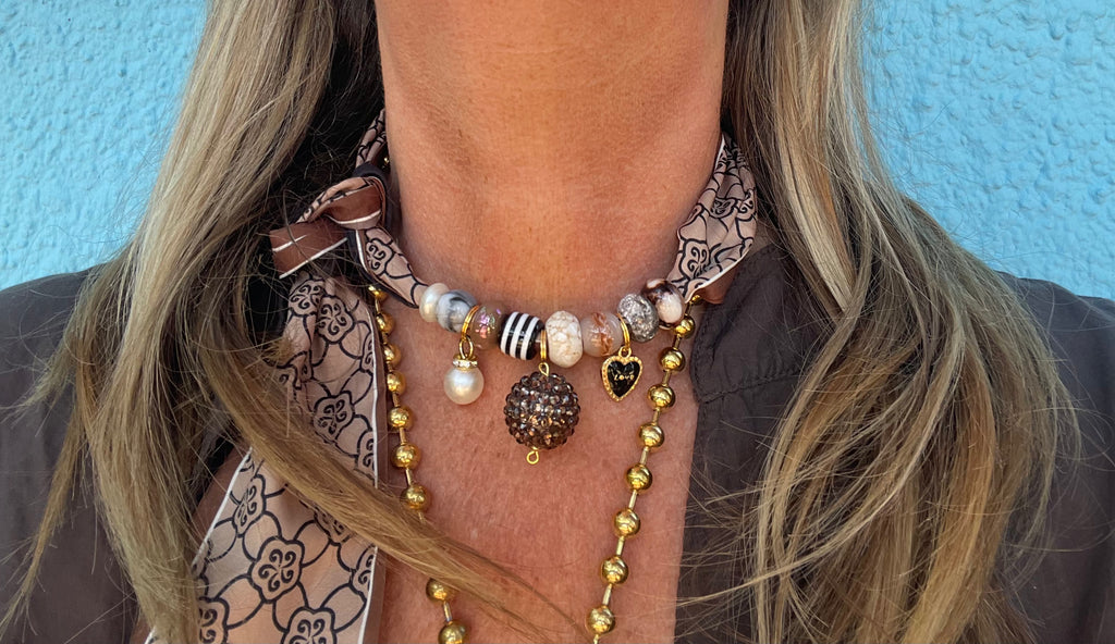 Sjaalketting® 
- Bruin zwart met bruine bal