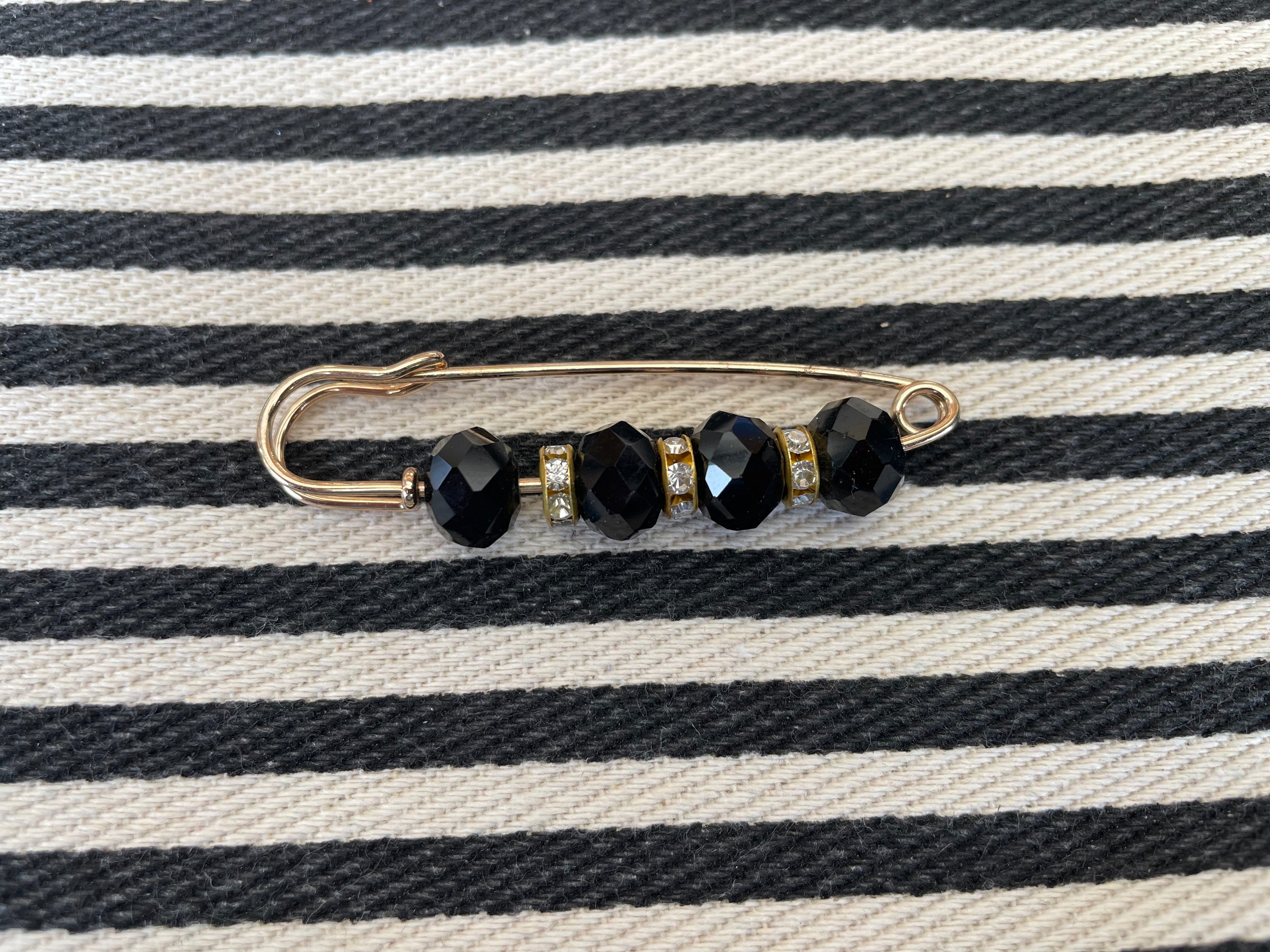 Broche - Gouden speld met zwart
