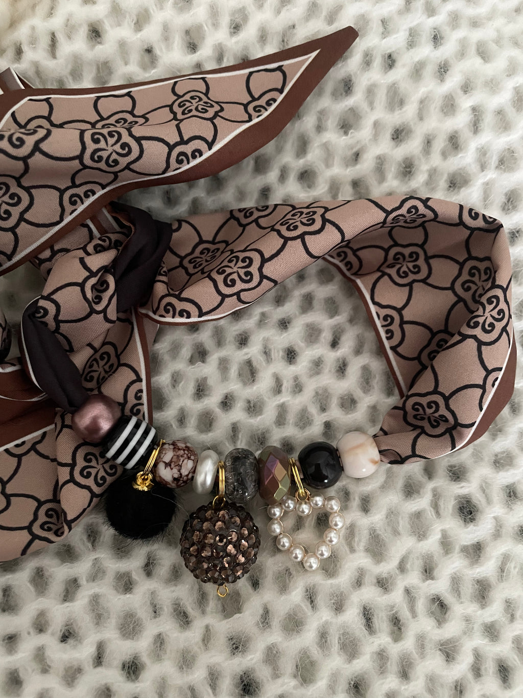 Sjaalketting® 
- Bruine bal