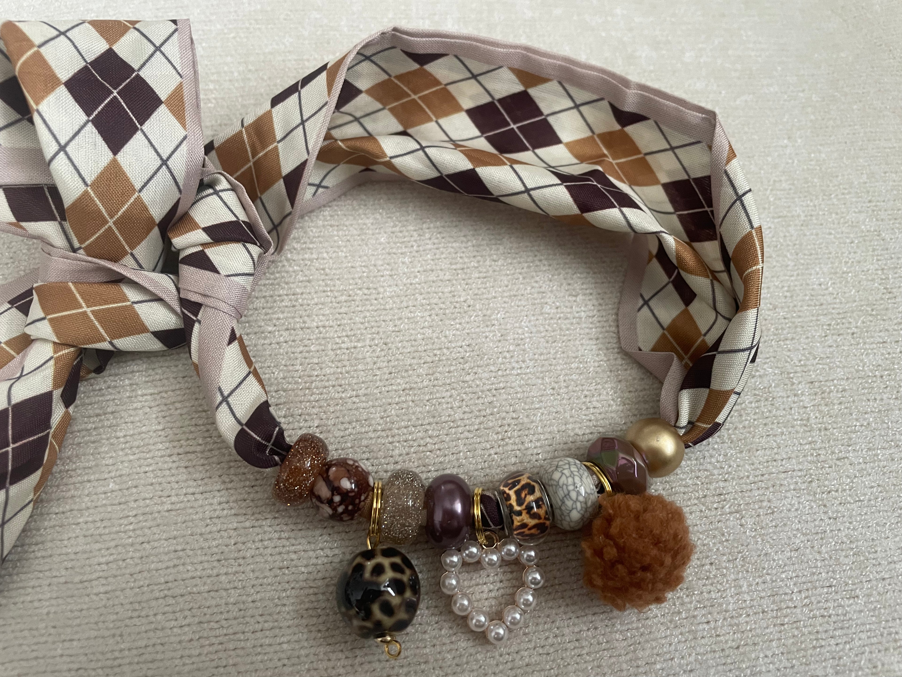 Sjaalketting® - Bruin spek